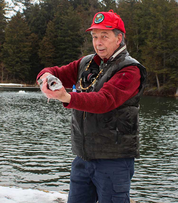 Brian Vickery holding a fish at the franklin club