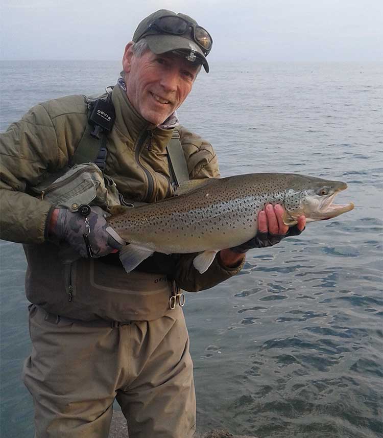 dave holding a fish - the franklin club professional